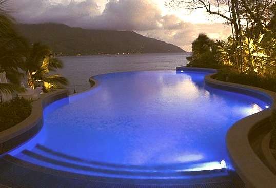Glowing pool in the evening at Northolme Hotel, Seychelles