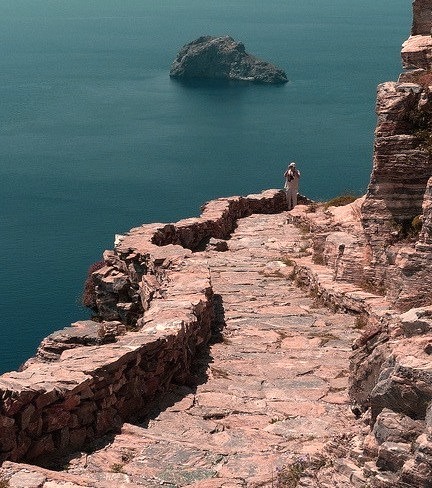 Seaside rocky trail toward the Monastery of Panagia Hozoviotissa, Amorgos island, Greece